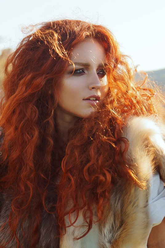 Sexy redhead long hair curly